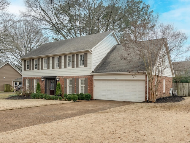 colonial house featuring a garage