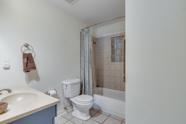 full bathroom with tile patterned flooring, vanity, shower / tub combo, and toilet