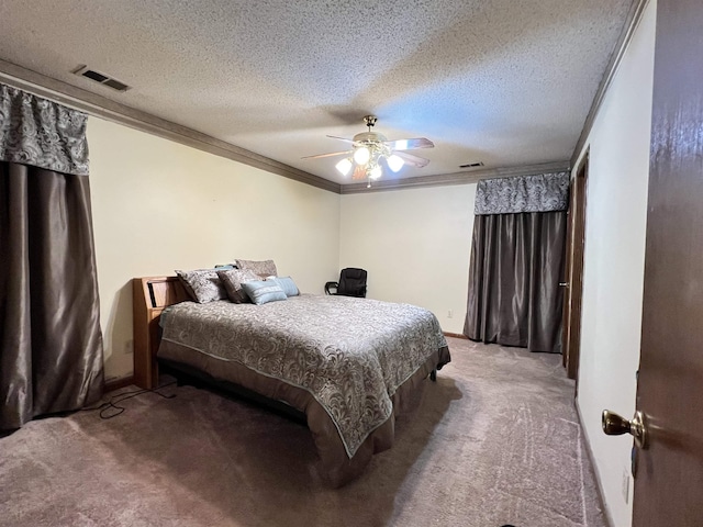 carpeted bedroom featuring ceiling fan, a textured ceiling, and ornamental molding