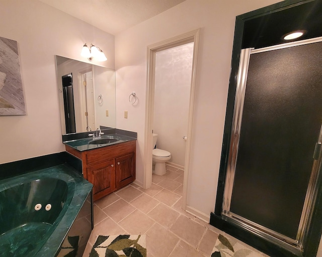 full bathroom with toilet, vanity, plus walk in shower, and tile patterned flooring