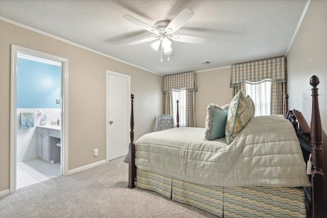 carpeted bedroom featuring ceiling fan, crown molding, ensuite bathroom, and a textured ceiling