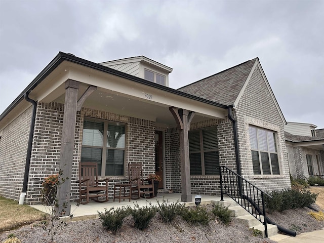 view of front of home featuring covered porch