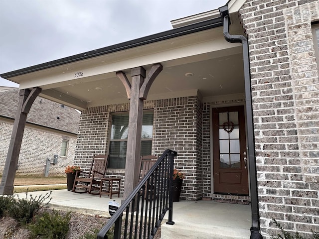 property entrance featuring covered porch