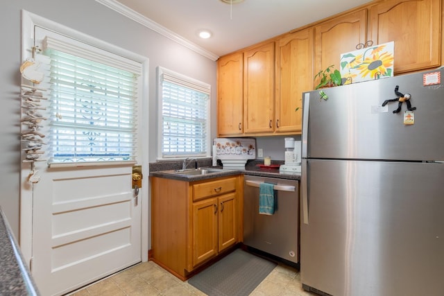 kitchen with crown molding, sink, and stainless steel appliances