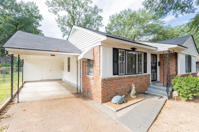 view of front of house with a carport