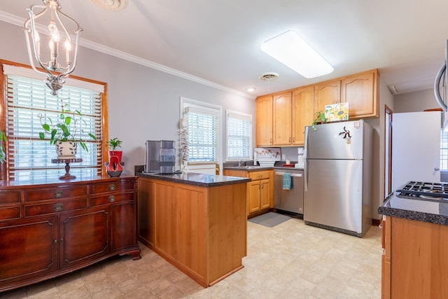 kitchen featuring kitchen peninsula, appliances with stainless steel finishes, a chandelier, and dark stone counters