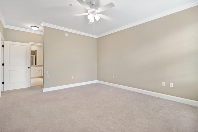 empty room with light colored carpet, ceiling fan, and ornamental molding