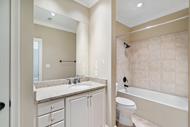 full bathroom featuring tile patterned flooring, crown molding, toilet, vanity, and tiled shower / bath