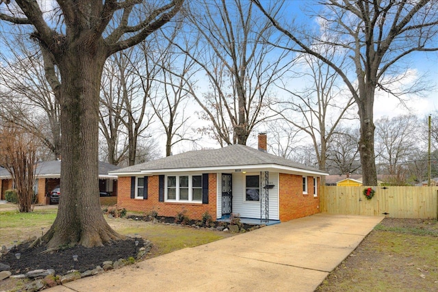 ranch-style house with a front lawn