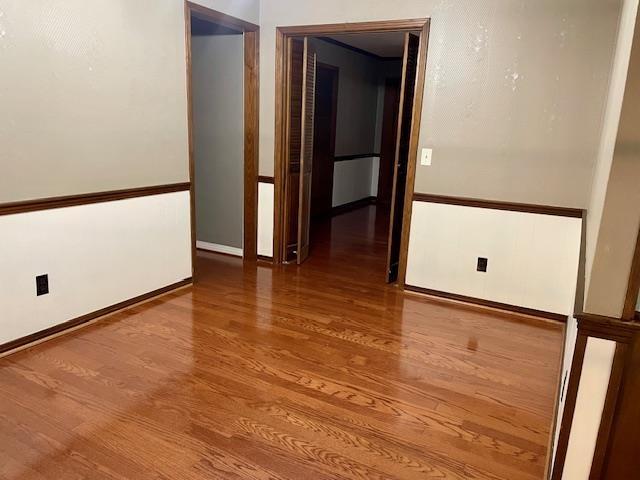 empty room featuring hardwood / wood-style floors