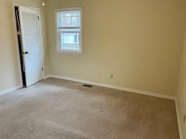 empty room with light carpet