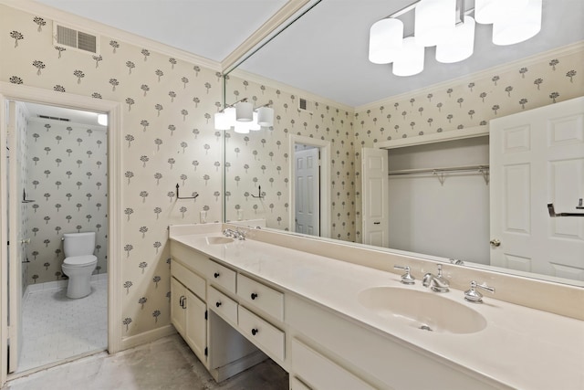 bathroom with tile patterned flooring, vanity, toilet, and ornamental molding