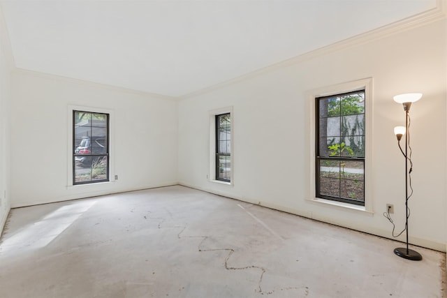 unfurnished room featuring ornamental molding