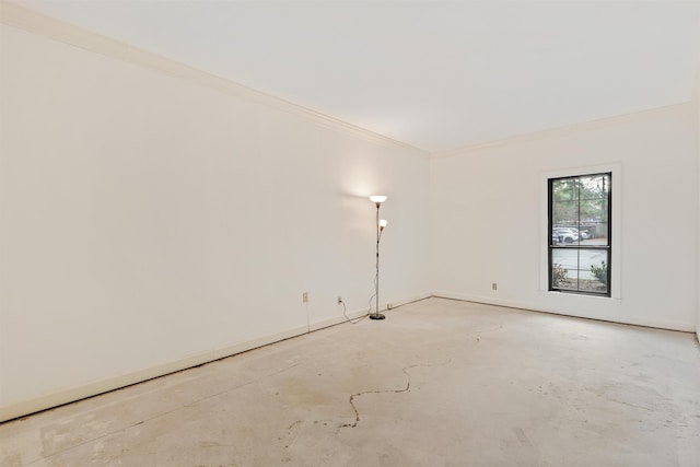 empty room featuring ornamental molding