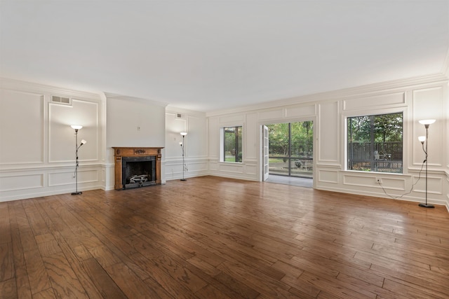 unfurnished living room with hardwood / wood-style floors