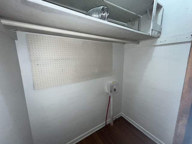 washroom with dark hardwood / wood-style floors