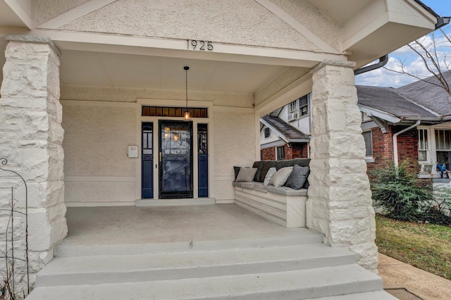 property entrance with a porch