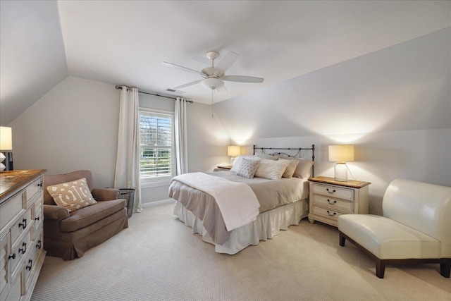 carpeted bedroom featuring ceiling fan and vaulted ceiling