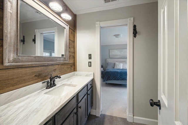 bathroom featuring vanity and crown molding