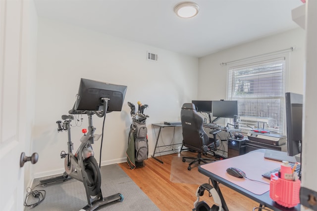 home office with light wood-type flooring