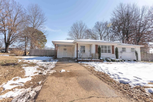 single story home with covered porch