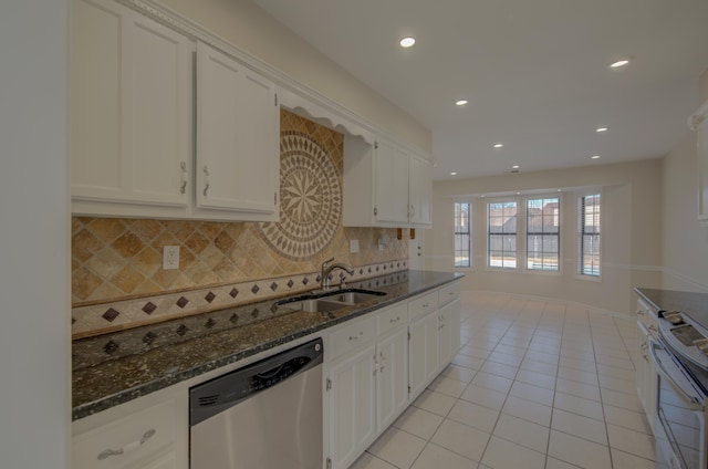 kitchen featuring decorative backsplash, white cabinets, sink, electric range, and dishwasher