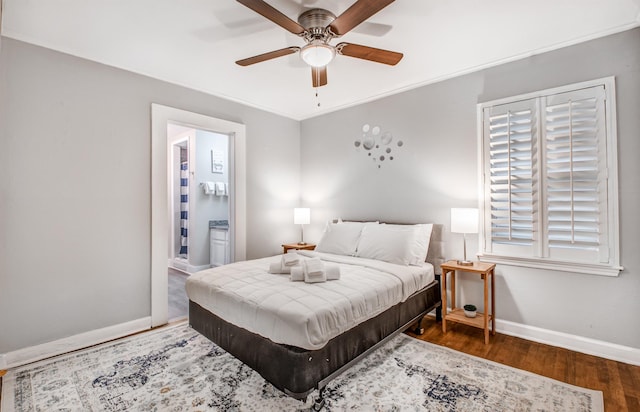 bedroom featuring multiple windows, ceiling fan, and dark hardwood / wood-style flooring