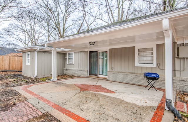 entrance to property with a patio area