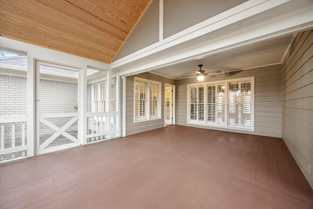 unfurnished sunroom with ceiling fan, wood ceiling, and lofted ceiling