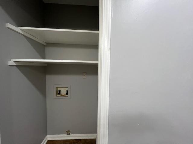 laundry area featuring hookup for a washing machine and wood-type flooring