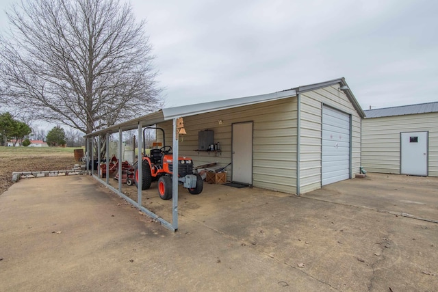 view of outbuilding with a garage