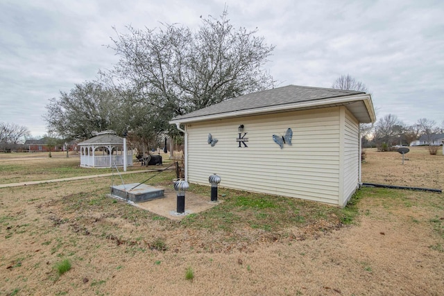 view of home's exterior featuring a yard