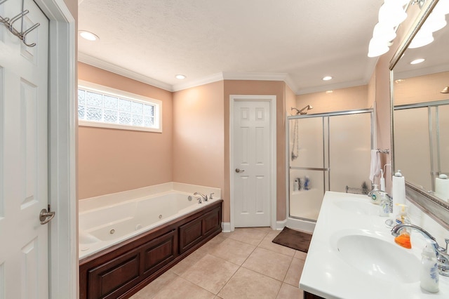 bathroom featuring tile patterned floors, vanity, separate shower and tub, and ornamental molding