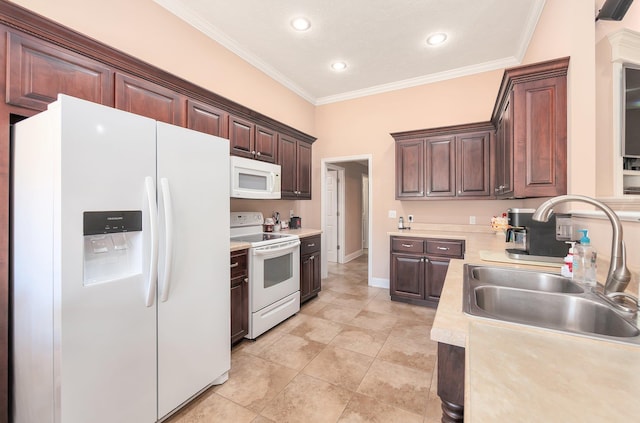 kitchen with light tile patterned floors, white appliances, ornamental molding, and sink