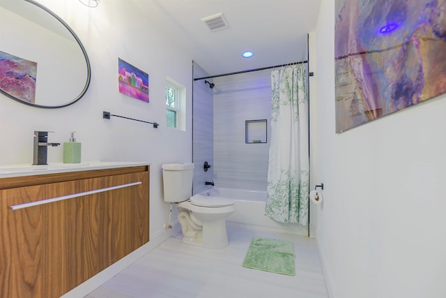 full bathroom featuring vanity, shower / bathtub combination with curtain, and toilet