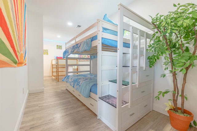 bedroom with light wood-type flooring