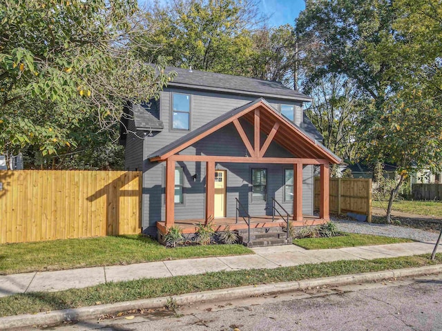 view of front of property featuring covered porch