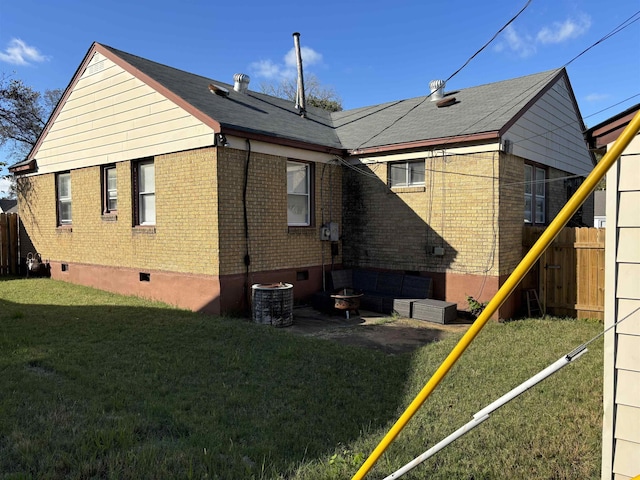 back of house with a lawn, a patio area, an outdoor living space, and central air condition unit