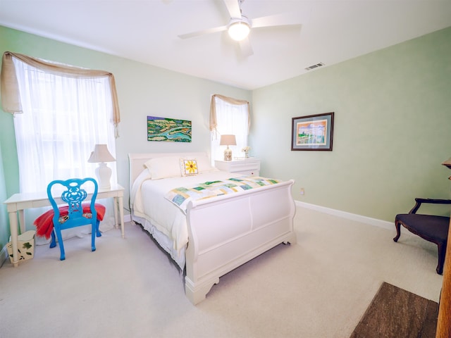 carpeted bedroom with ceiling fan