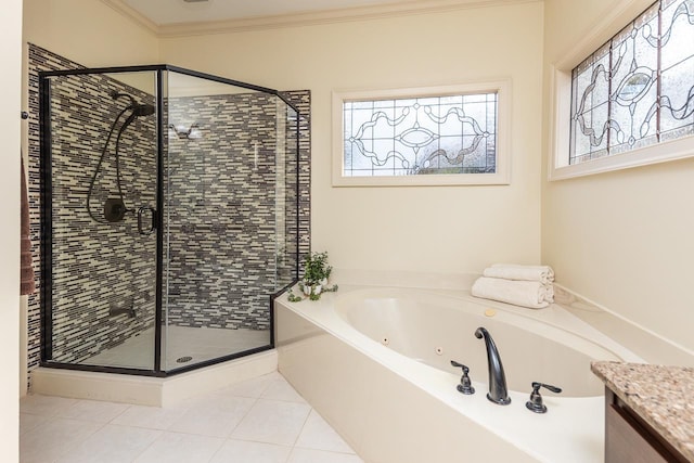 bathroom with crown molding, plenty of natural light, vanity, and tile patterned floors