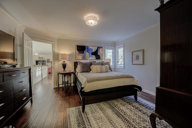 bedroom featuring dark hardwood / wood-style floors and ornamental molding