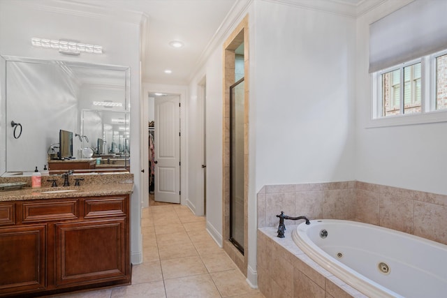 bathroom with plus walk in shower, tile patterned flooring, vanity, and ornamental molding