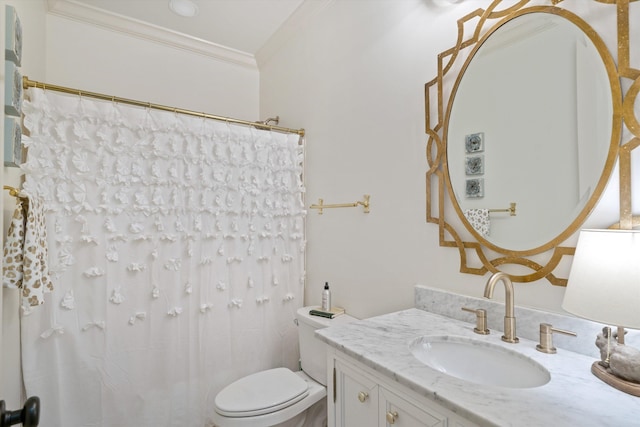 bathroom featuring vanity, toilet, and ornamental molding