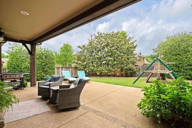 view of patio with a playground and area for grilling