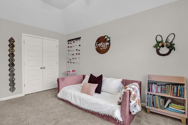 carpeted bedroom featuring a closet