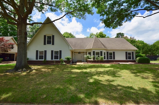 view of front of home with a front yard