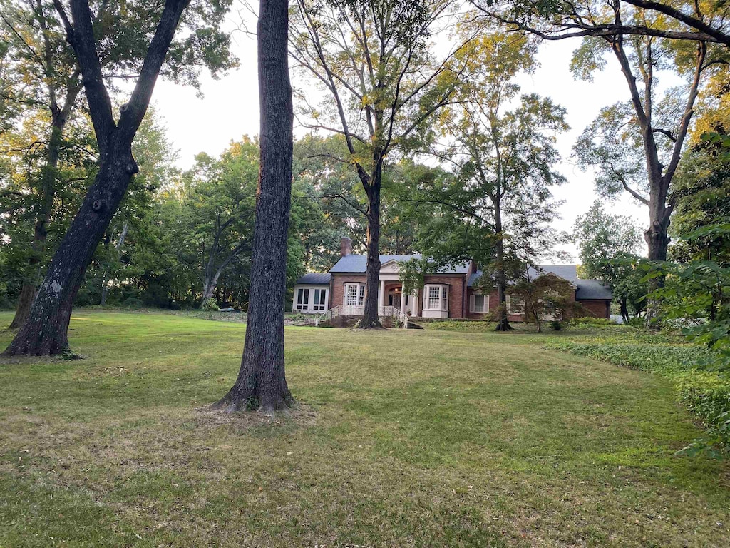 view of front of home with a front yard