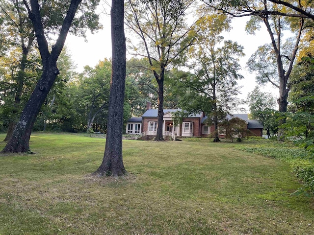 view of front of home with a front yard