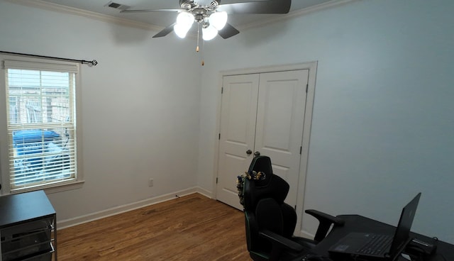 office with crown molding, ceiling fan, and dark hardwood / wood-style flooring