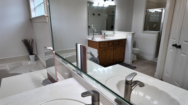 bathroom featuring vanity, tile patterned floors, and shower with separate bathtub